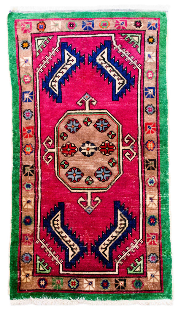 Damon Wool Carpet – Red Backdrop with Tribal Emblem